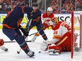 Calgary Flames goaltender Jacob Markstrom makes a save on Edmonton Oilers forward Leon Draisaitl during the first period in game three of the second round of the 2022 Stanley Cup Playoffs at Rogers Place.