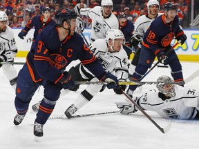 Edmonton Oilers forward Connor McDavid (97) scores against Los Angeles Kings goaltender Jonathan Quick (32) during the third period in game five of the first round of the 2022 Stanley Cup Playoffs at Rogers Place in Edmonton, May 10, 2022.