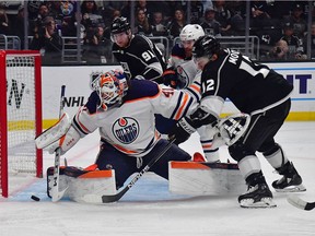 Edmonton Oilers goaltender Mike Smith defends the goal against Los Angeles Kings center Trevor Moore during the second period in game six of the first round of the 2022 Stanley Cup Playoffs at Crypto.com Arena.