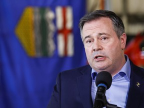 Jason Kenney speaks in Calgary, Alta., Friday, March 25, 2022. The Alberta premier is urging the U.S. government to convince Michigan to abandon its legal campaign against the Line 5 pipeline.THE CANADIAN PRESS/Jeff McIntosh