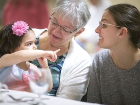 Three generations, Emelia Moran, 2, her grandmother, Nadia Pecile, and her mother, Erica Pecile-Morand, enjoy a Mother's Day brunch at the Fogolar Furlan on Sunday, May 8, 2022.