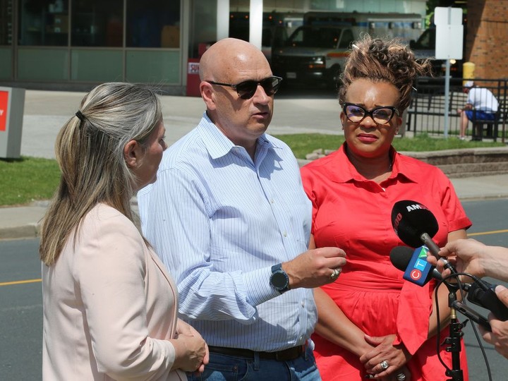  Local provincial NDP candidates Lisa Gretzky (Windsor West), left, Ron LeClair (Essex) and Gemma Grey-Hall, (Windsor-Tecumseh) are shown at a press conference regarding health care in Windsor on Friday, May 20, 2022.