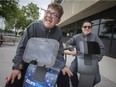 St. Clair College CICE students, Kyle Schauer, left, and Evan Fairlie, are pictured with recently donated Temi Robots, on Wednesday, May 25, 2022.