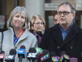 Clayton Babcock (right) and Linda Babcock read a statement outside a Toronto courthouse on Feb. 26, 2018, after a sentencing hearing for Dellen Millard and Mark Smich, who were convicted of the first degree murder of their daughter Laura Babcock.