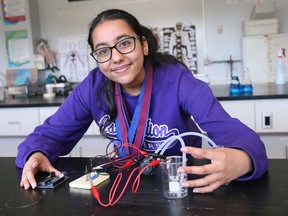 Assumption College Catholic High School student Sohila Sidu is shown with her science project on Friday, May 13, 2022. The grade 10 student won the UWindsor Faculty of Science Award at the Windsor Regional Science Fair which now qualifies her for the national science fair.