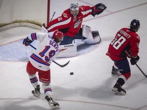 \Kitchener's Joseph Serpa gets stopped by Windsor goalie, Mathius Onuska during OHL playoff action at the WFCU Centre.