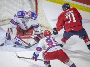 Windsor Spitfires forward Josh Currie had his goal attempt deflected by Kitchener Rangers goalkeeper Pavel Cajan on Saturday at the WFCU Center.