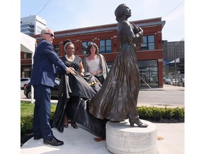 The University of Windsor unveiled a statue of abolitionist and newspaper publisher Mary Ann Shadd on Thursday, May 12, 2022. The bronze sculpture sits at the corner of Chatham and Ferry, site of the former Windsor Star building and current home to the university’s Windsor Hall. University president Robert Gordon, university director of anti-racism organizational change Marium Tolson-Murtty, centre, and local artist Donna Mayne who created the statue unveil the sculpture.