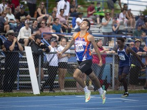 Omar Chaaban was one of 14 members of the Sandwich Sabres to secure a first-place finish at the OFSAA West Regional track and field meet as he crosses the line to win the junior boy's 200 metres in 23.10 seconds on Saturday.