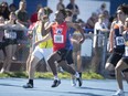 Holy Names Knights' sprinter Semi Mugenzi competes in the junior boys' 200 metres during Thursday's WECSSAA track and field championships at Sandwich Secondary School.