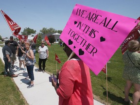 Long-term care protest: Unifor members participate in a rally in front of the Banwell Gardens Care Centre in Windsor on Monday, May 30, 2022.