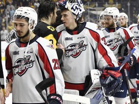 Windsor Spitfires' goalie Matt Onuska shakes hands after the game following the team's loss in Game 7 of the OHL final to the Hamilton Bulldogs on Wednesday.