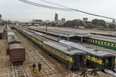 Policemen walk along trains stationed on a deserted platform at Karachi Cantonment railway station during a government-imposed nationwide lockdown as a preventive measure against the COVID-19 coronavirus in Karachi on March 26, 2020. (Photo by ASIF HASSAN/AFP via Getty Images)