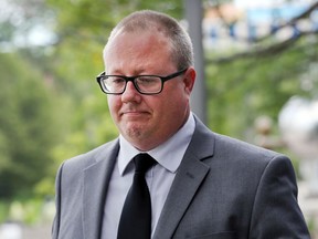 Andrew Cowan, then 47, is shown leaving the Superior Court of Justice building in Windsor on Aug. 1, 2017, near the start of his murder trial for the death of a friend in 2012.