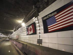 The Canada-US border line at the Windsor/Detroit Tunnel is shown on November 8, 2021.