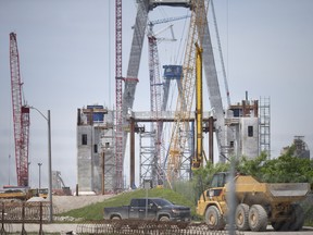 Construction activity on the Gordie Howe International Bridge, with a view from the Canadian side photographed Monday, June 13, 2022, has reached its peak level.