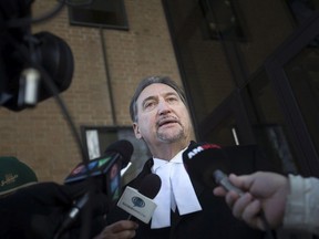 Patrick Ducharme, defence lawyer for Andrew Cowan, speaks to media outside the Superior Court of Justice building on Dec. 12, 2017, shortly after his client was sentenced to life for killing his friend Edward Witt in 2012.