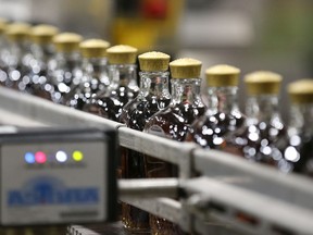 Crown Royal whisky bottles are shown at the Diageo Canada bottling plant in Amherstburg on Friday, June 3, 2022.