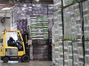 A forklift operator moves stock at the Diageo Canada bottling plant in Amherstburg on Friday.