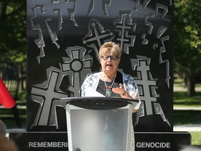 Leisha Nazarewich, president of the Ukrainian Canadian Congress Branch Windsor speaks during a ceremony on Thursday, June 23, 2022 to rededicate the Holodomor Monument at the Jackson Park.