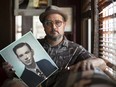 Walter Cassidy holds a photo of a young Bill Kovinsky, on Thursday, June 16, 2022.