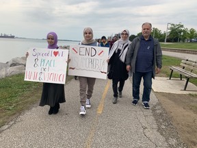 Members of Windsor's Muslim community march against Islamophobia on June 6, 2022, on the first anniversary of the murder of the Afzaal family in London.