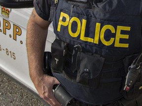 An Ontario Provincial Police officer is shown in this Postmedia file photo.