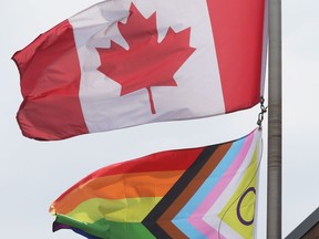A Pride flag flies alongside the Canadian flag at the Greater Essex County District School Board administrative offices in downtown Windsor on Wednesday, June 1, 2022.