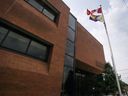 WINDSOR, ONTARIO.  JUNE 1, 2022 - A Pride flag flies alongside the Canadian flag at the Greater Essex County District School Board administrative office in downtown Windsor on Wednesday, June 1, 2022.