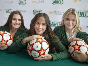 St. Clair College women's soccer recruits, from left, Sydnie Lucier, Angelica Petro, and Airika Natyshak, who all played high school soccer together at L'Essor.