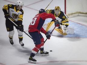 Windsor Spitfires' captain Will Cuylle misses on a scoring opportunity against Hamilton Bulldogs' goalie, Marco Costantini, in the first period of Monday's game at the WFCU Centre.