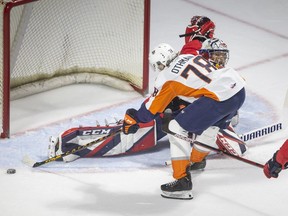 Flint Firebirds' captian  Brennan Othmann gets stopped by Windsor Spitfires' goaltender Xavier Madina on a breakaway in Game 7 of Wednesday's Western Conference final.