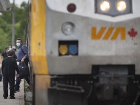 Passenger disembarks a VIA Rail train at the Walkerville train station, on Wednesday, June 8, 2022.
