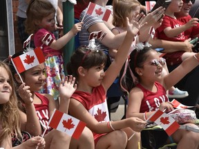 Lots of Maple Leaf flags were being waved and worn along the Canada Day parade route on Wyandotte Street East on Friday, July 1, 2022. It was Windsor's first in-person national celebration since 2019, and it was crowded and happy.