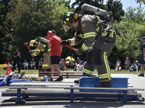 Firefighters from across Essex County compete in the Firefighter Combat Challenge, an obstacle course of tasks designed to simulate the real conditions firefighters face on the job. The challenge was held on Sunday, July 3 in Tecumseh as part of the town’s 100th anniversary celebrations.