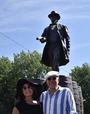 Mark and Laura Williams, the artists behind the Hiram Walker statue now located on Riverside Drive and Devonshire Road, attended the unveiling of the large bronze artwork on July 2, 2022.  Mark has sculpted the figure of Walker - based on friend Joe Lemay's gait and posture - while Laura created the whiskey casks that Walker stands on.