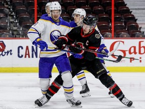 Newly signed Detroit Red Wings' defenceman Richard Hagg, at left, is seen in action last season for the Buffalo Sabres.