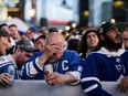 Fans react during game seven of the Toronto Maple Leafs NHL playoff hockey game against the Tampa Bay Lightning, in Toronto on Saturday May 14, 2022.