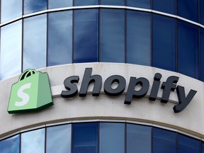 The logo of Shopify is seen outside its headquarters in Ottawa, Sept. 28, 2018.