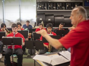Michael Seguin is shown practicing on May 28, 2022, with the Windsor Optimist Youth Band after the building they practice in was named after Seguin for his 40 years of service to the organization.