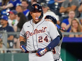 Detroit Tigers designated hitter Miguel Cabrera celebrates toward the dugout against the Kansas City Royals after hitting a one run single in the seventh inning at Kauffman Stadium.