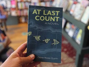 A copy of Claire Ross Dunn's new novel At Last Count. Dunn will be at Windsor's Biblioasis on July 26, 2022, to sign copies of her book and speak with readers.