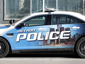 A City of Detroit Police vehicle is parked at the curb April 17, 2014 in Detroit, Michigan.