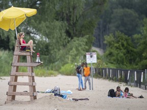 Lifeguard on duty, warning signs posted, fencing set up for off-limits swim area — Sand Point Beach on Monday, July 11, 2022, had plenty of good precautions in place for safer public swimming.