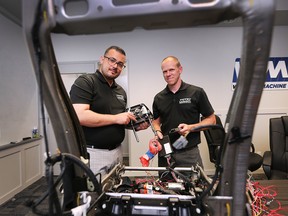 Ahmad Farghawi, left, vice-president of engineering and Mark Little, advanced engineering manager at Windsor Machine Group are shown at the company on Monday, July 25, 2022. The company has developed new head rest technology to mitigate whiplash with rear-end collisions.