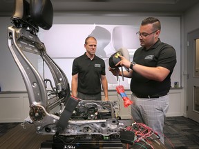 Mark Little, left, advanced engineering manager and Ahmad Farghawi, vice-president of engineering at Windsor Machine Group are shown at the company on Monday, July 25, 2022. The company has developed new head rest technology to mitigate whiplash with rear-end collisions.