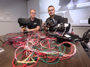 Mark Little, left, advanced engineering manager and Ahmad Farghawi, vice-president of engineering at Windsor Machine Group are shown at the company on Monday, July 25, 2022. The company has developed new head rest technology to mitigate whiplash with rear-end collisions.