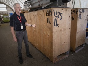 Canadian Aviation Museum president Don Christopher shows two crates containing horizontal stabilizers for the Avro Lancaster, at the Canadian Aviation Museum in Windsor on Tuesday.