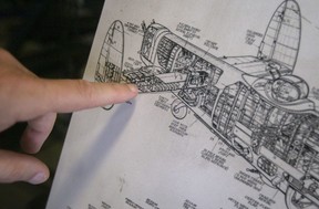 Don Christopher points on a Lancaster blueprint to one of the two horizontal stabilizers for the Avro Lancaster, at the Canadian Aviation Museum, on Tuesday.