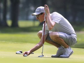 Essex's  Alek Mauro lines up a putt during the Jamieson Junior Golf Tour on Wednesday at the Essex Golf and Country Club. Mauro won the collegiate men's division with a one-under par 70.